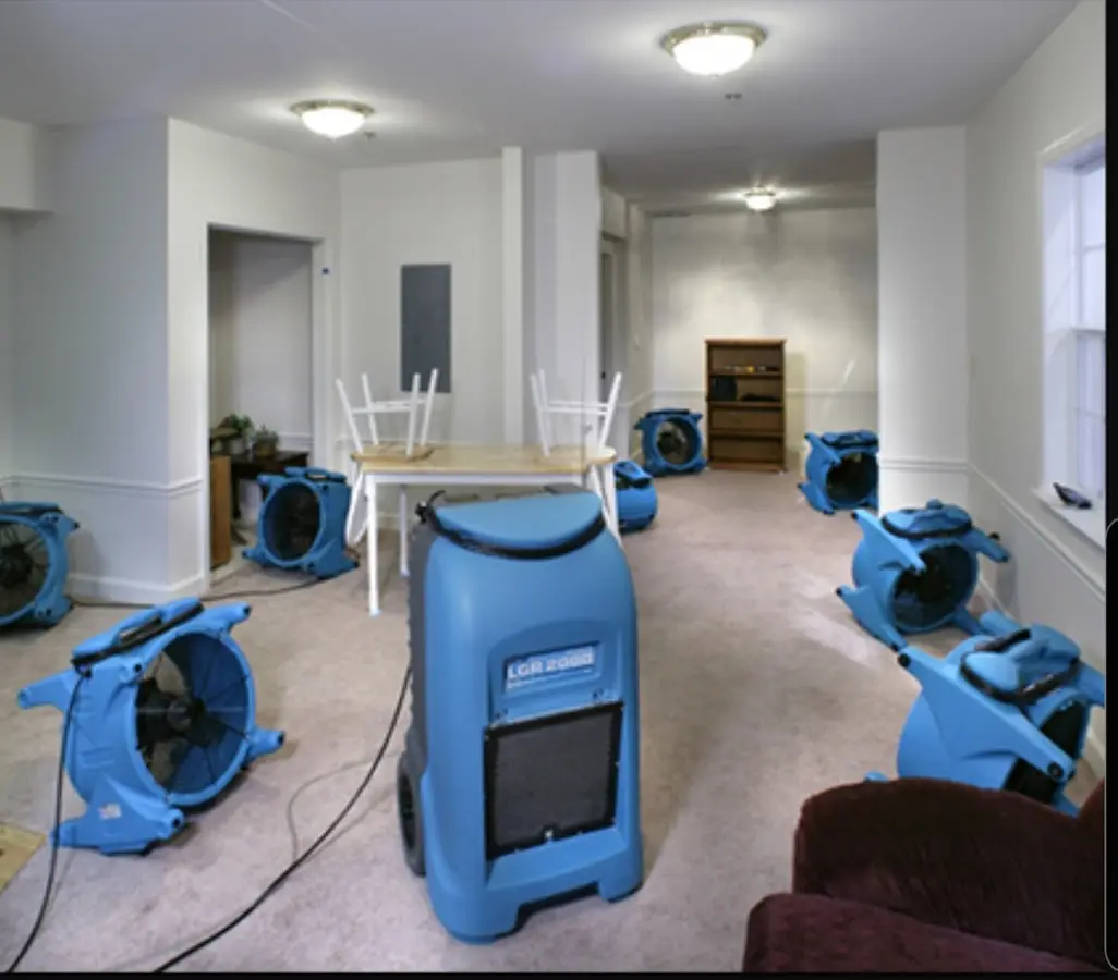 Air movers and dehumidifier setup for Water Damage Restoration in Church Hill